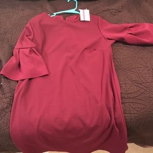 Burgundy boutique dress. NWT. Size M.